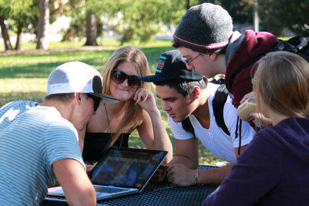 student campus table laptop